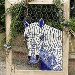 Blue and white horse mosaic artwork