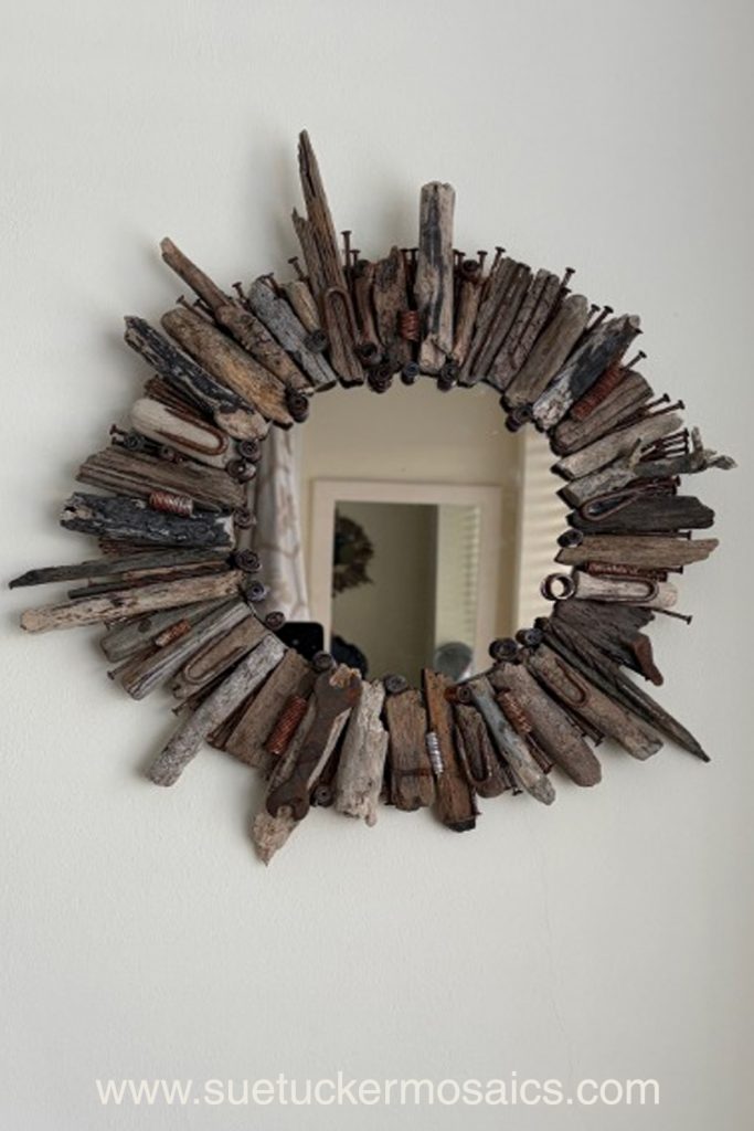 Aerial views of the earth have influenced my collection of mixed-media wall art. These pieces capture the essence of forests, woodlands, farmland, mountains, volcanoes, rock formations, oceans, meandering rivers and streams. Using logs, branches, twigs, driftwood, bamboo, bark, slate, seed pods, shells, moss, stones, and ceramic fragments—along with nails and springs naturally weathered over time.