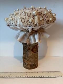 My handcrafted fabric and wood mushroom collection is inspired by the quiet beauty of nature and the magic found in small details. Each piece is carefully made using beautiful upcycled fabrics and finished with delicate beads, giving every mushroom its own unique character. No two are ever the same — just like the natural world that inspires them. From the textures of the wood to the richness of the repurposed textiles, every element is chosen with care to create something truly special.