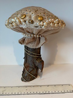 My handcrafted fabric and wood mushroom collection is inspired by the quiet beauty of nature and the magic found in small details. Each piece is carefully made using beautiful upcycled fabrics and finished with delicate beads, giving every mushroom its own unique character. No two are ever the same — just like the natural world that inspires them. From the textures of the wood to the richness of the repurposed textiles, every element is chosen with care to create something truly special.