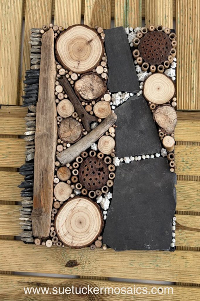 Aerial views of the earth have influenced my collection of mixed-media wall art. These pieces capture the essence of forests, woodlands, farmland, mountains, volcanoes, rock formations, oceans, meandering rivers and streams. Using logs, branches, twigs, driftwood, bamboo, bark, slate, seed pods, shells, moss, stones, and ceramic fragments—along with nails and springs naturally weathered over time.