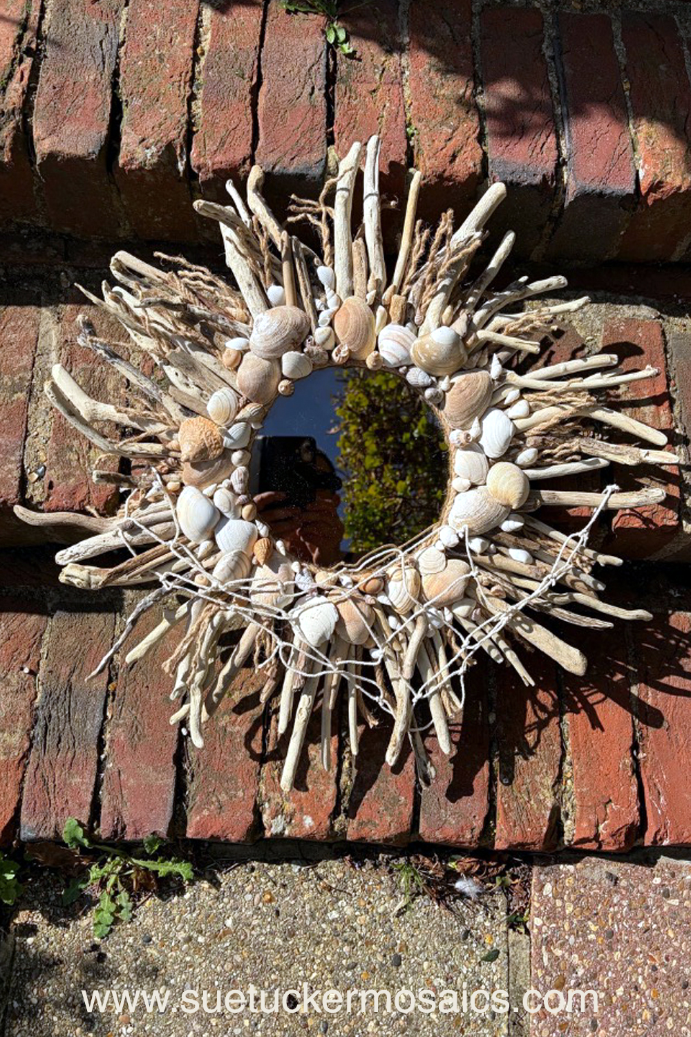 Aerial views of the earth have influenced my collection of mixed-media wall art. These pieces capture the essence of forests, woodlands, farmland, mountains, volcanoes, rock formations, oceans, meandering rivers and streams. Using logs, branches, twigs, driftwood, bamboo, bark, slate, seed pods, shells, moss, stones, and ceramic fragments—along with nails and springs naturally weathered over time.