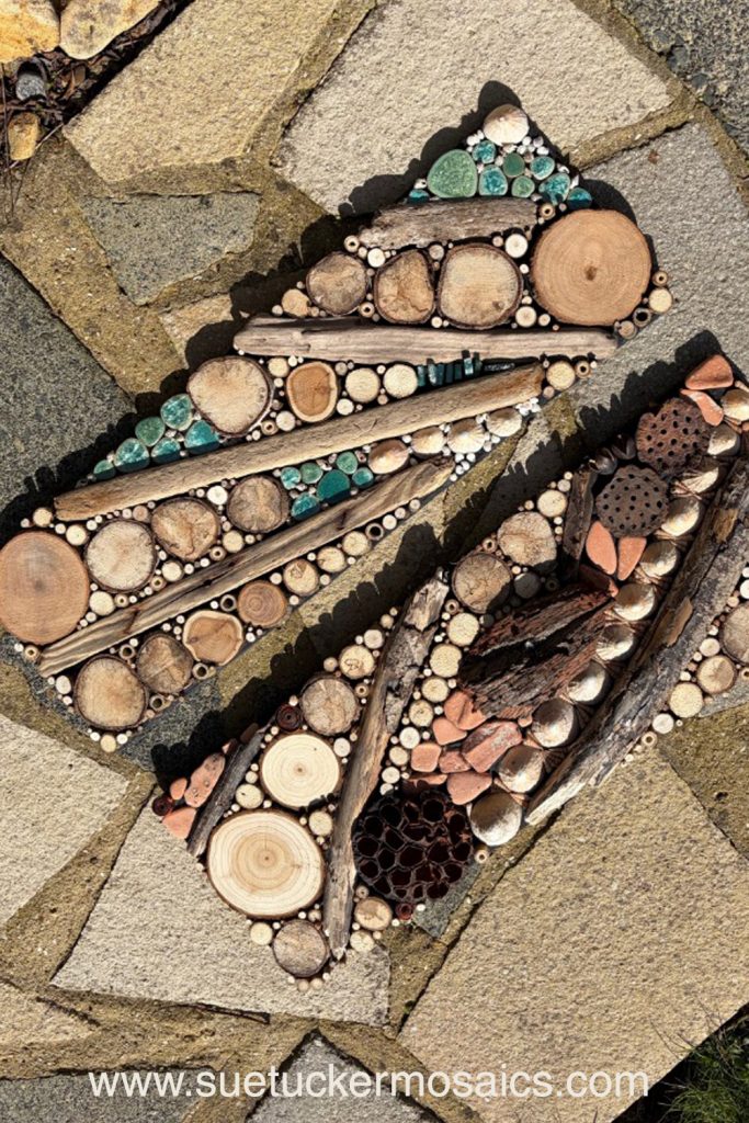 Aerial views of the earth have influenced my collection of mixed-media wall art. These pieces capture the essence of forests, woodlands, farmland, mountains, volcanoes, rock formations, oceans, meandering rivers and streams. Using logs, branches, twigs, driftwood, bamboo, bark, slate, seed pods, shells, moss, stones, and ceramic fragments—along with nails and springs naturally weathered over time.