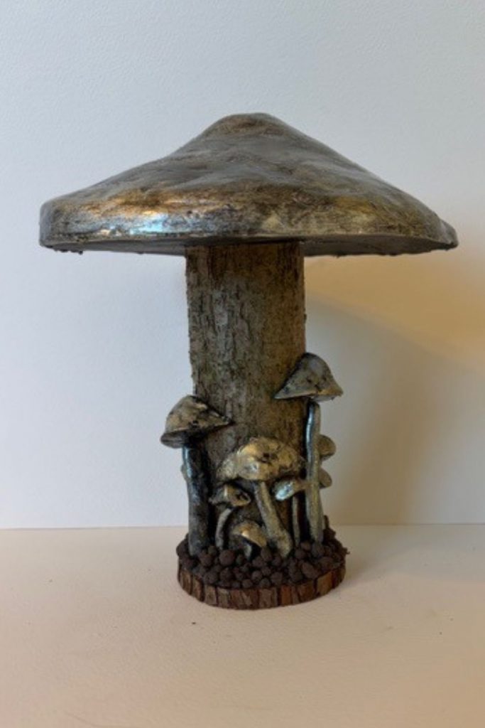 Each piece in my mushroom ornament collection is a celebration of nature and craftsmanship. Cast in eco-conscious resin and formed within bespoke silicone moulds that I create by hand, every ornament begins as a carefully considered, original design. Layers of metallic pigment are delicately applied to enhance texture and depth, before being sealed with a lustrous high-gloss varnish that catches the light beautifully. The forms are then grounded on natural log bases, each one unique, bringing an authentic connection to the woodland from which they are inspired. No two pieces are ever the same—each ornament is a small, sculptural work of art, where organic materials meet refined finish.